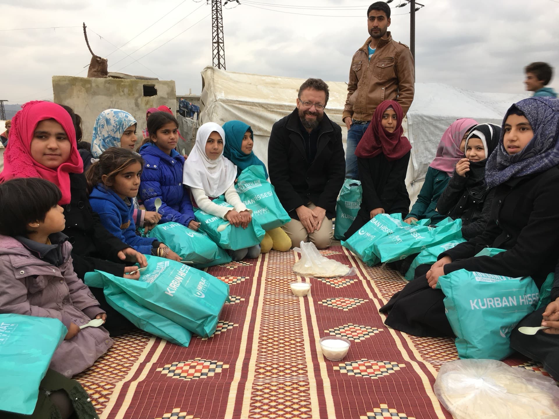 Dr. Witta with refugee children